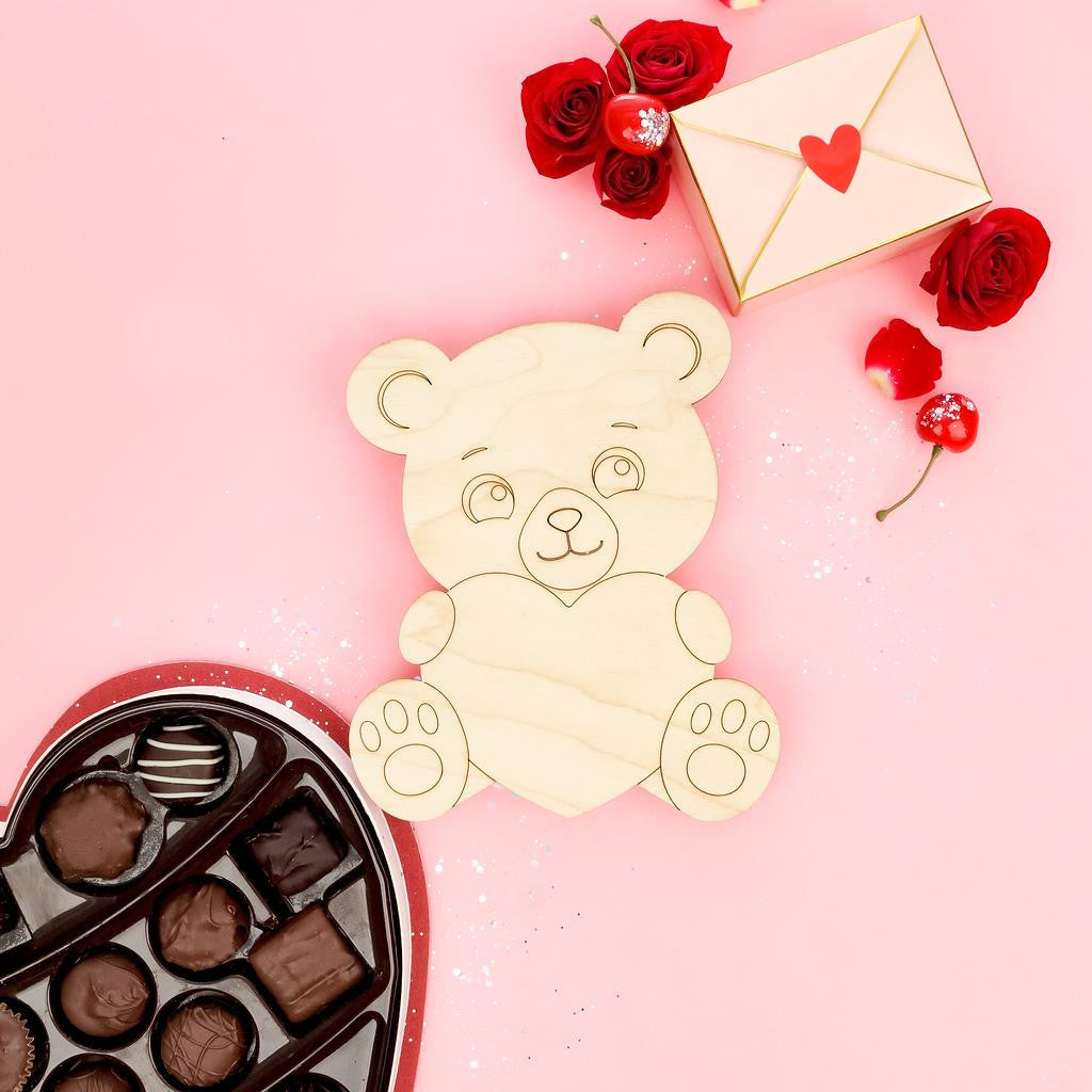 Teddy Bear Holding a Heart Cutout