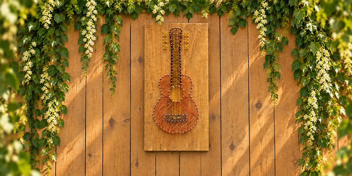 String art project with pine plywood guitar
